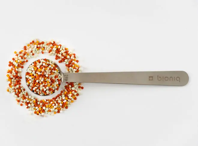 A scoop filled with Bioniq's orange and cream granules